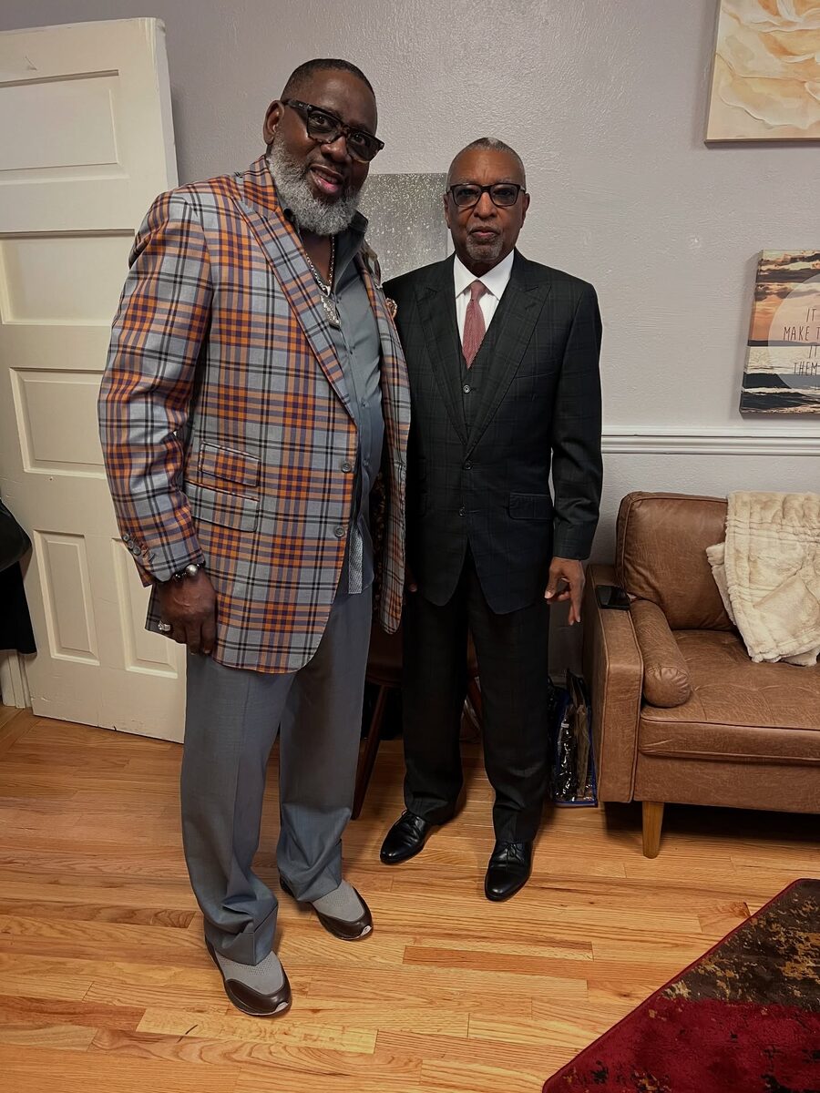 Bishop Gibson meeting with a community and civic leader
